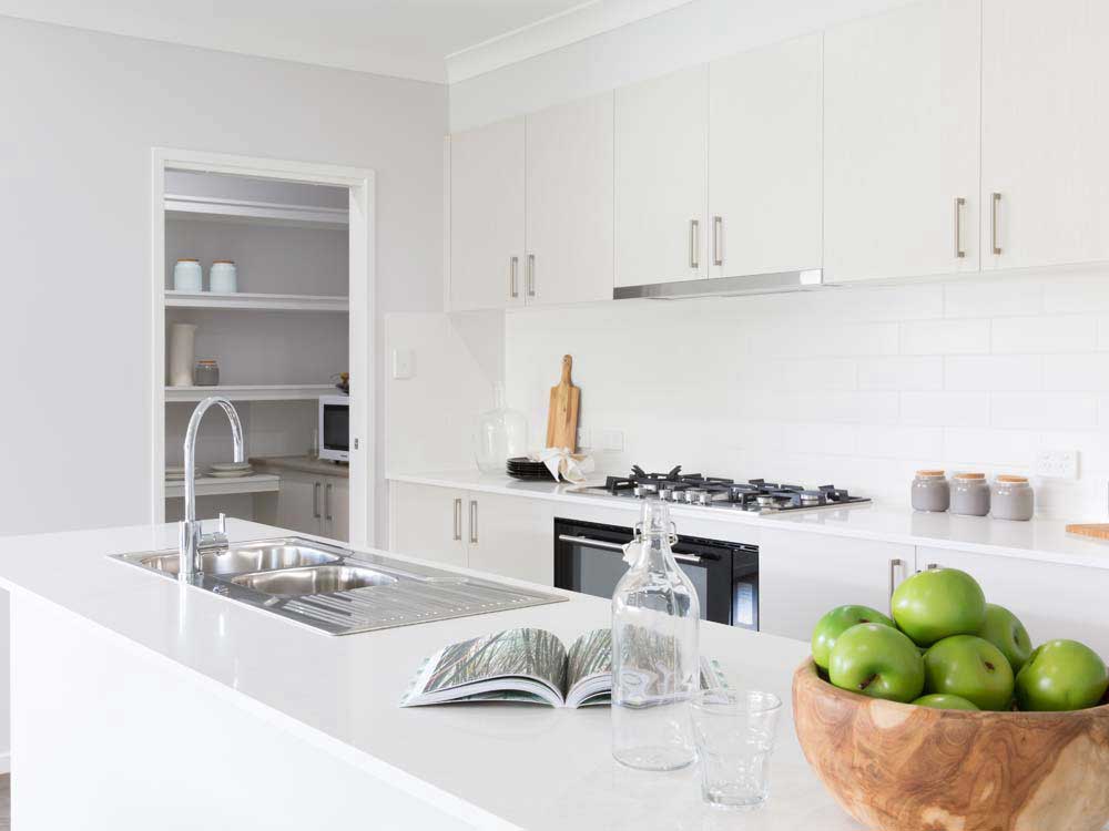 Open plan kitchen with walk in pantry