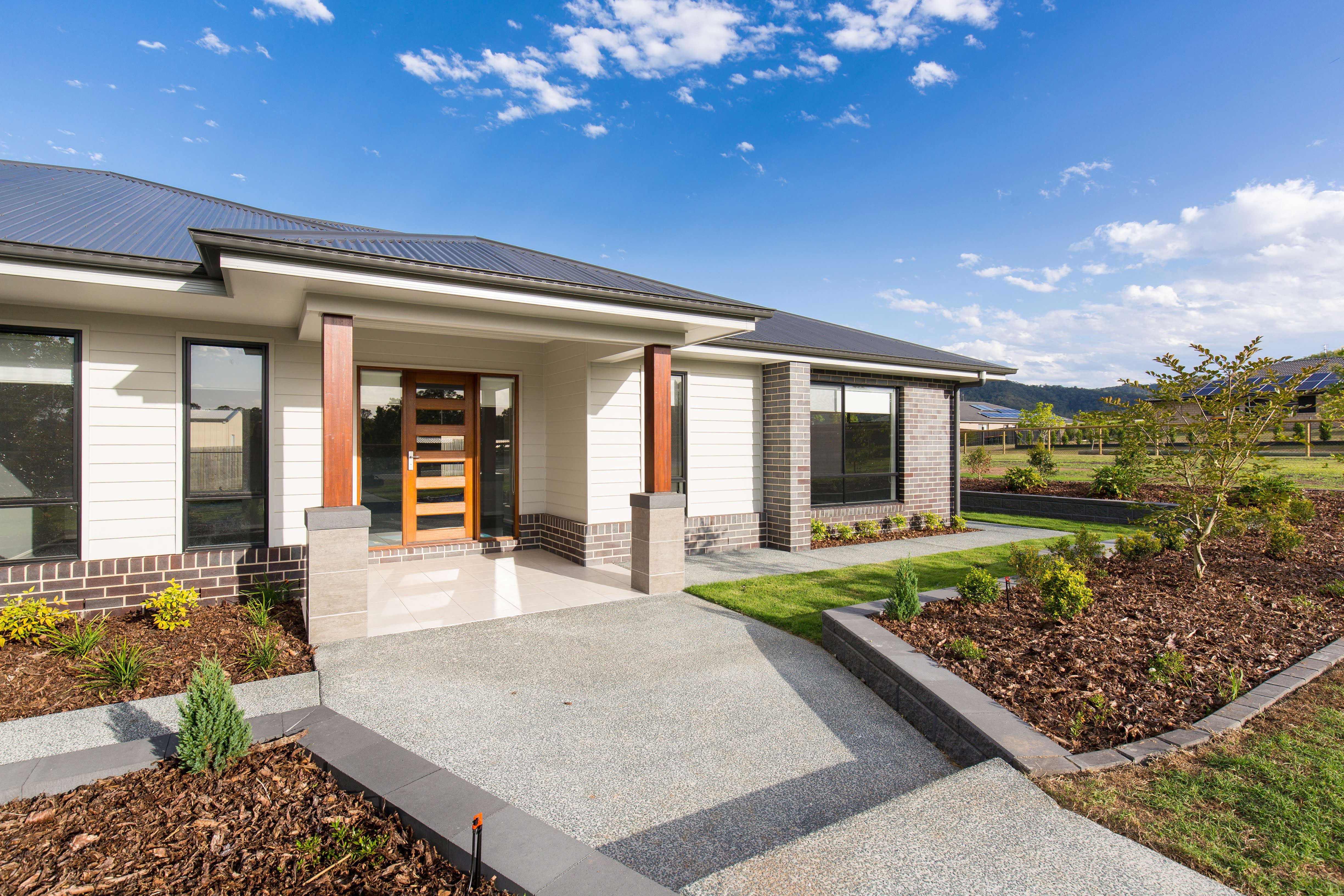 Main entry with beautiful timber door